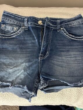 Women’s Dark Blue Distressed Denim Cutoff Shorts